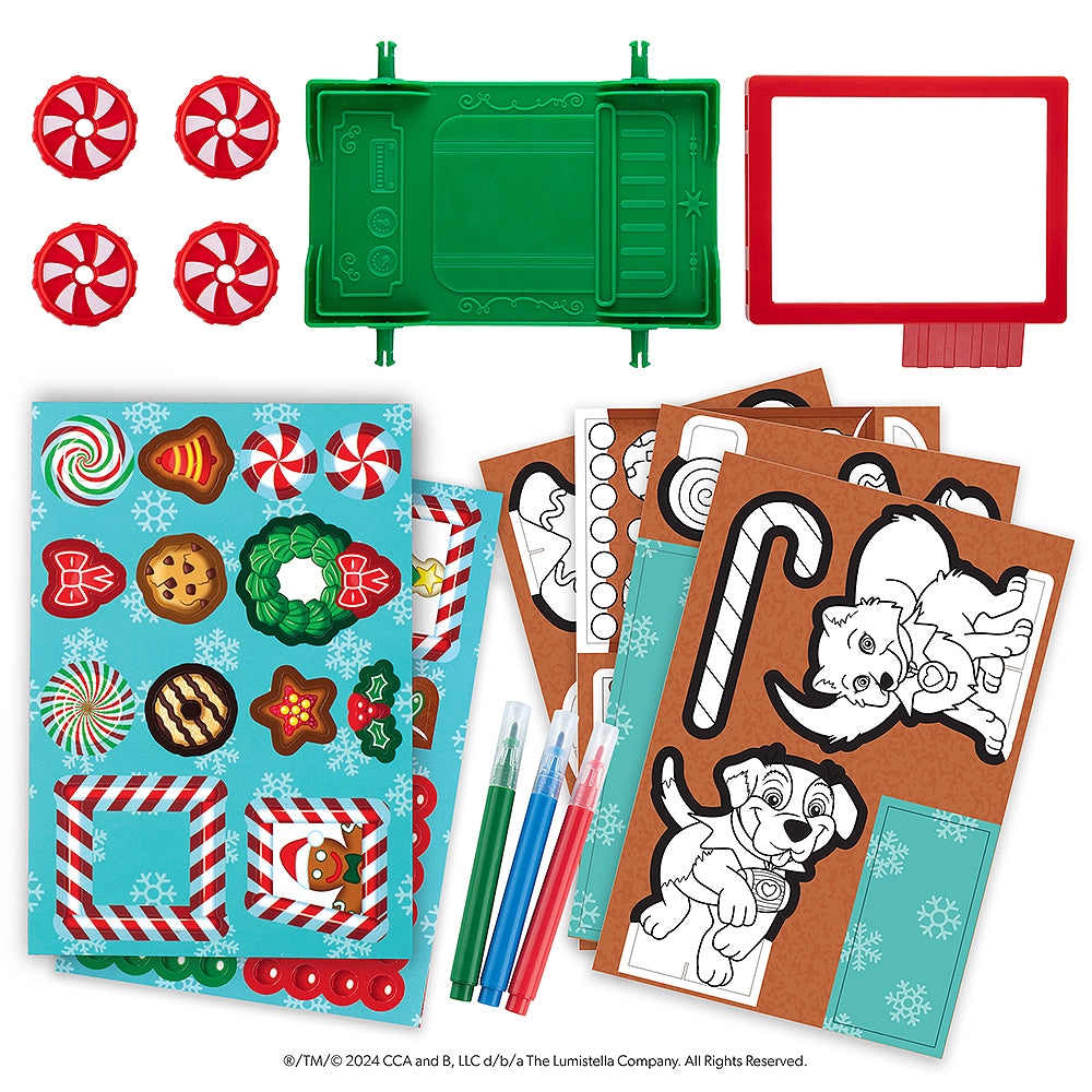 A product flat lay displaying all of the included pieces in the DIY Gingerbread Truck set