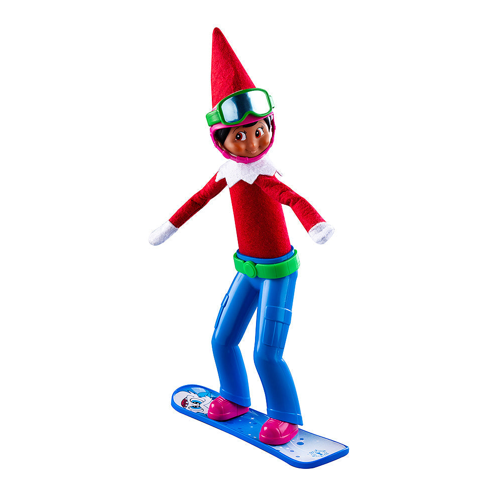 A girl Scout Elf staged wearing the MagiFreez® Swish and Sleigh Snowboard Set.