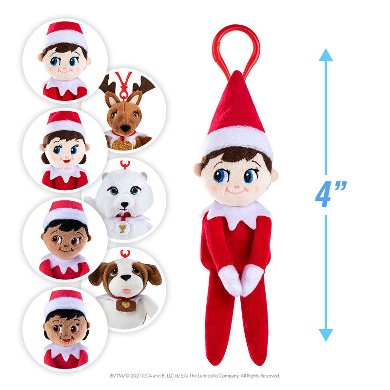 A collage of all Plushee Pals Mini Clips headshots on the left. This includes the Boy with Blue Eyes, Girl with Blue Eyes, Boy with Brown Eyes, Girl with Brown Eyes, Elf Pets Reindeer, Elf Pets Arctic Fox, and Elf Pets St. Bernard. On the right is a full product preview of the Boy with Blue Eyes. Next to the full width product is an indicator that it is 4 inches tall.