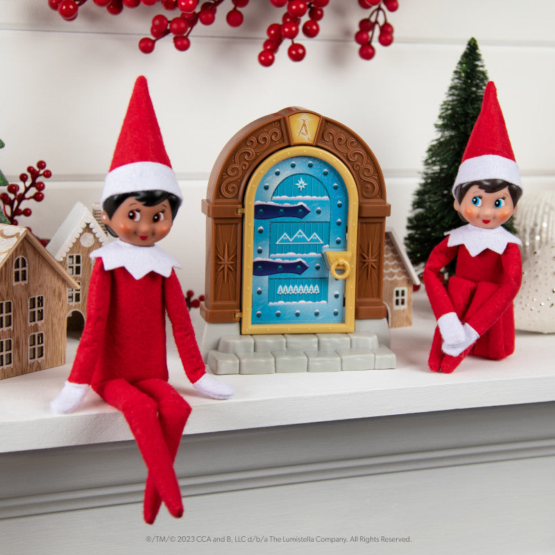 The Elf on the Shelf® Santaverse™ Elf Door - Girl Scout Elves Next To Door