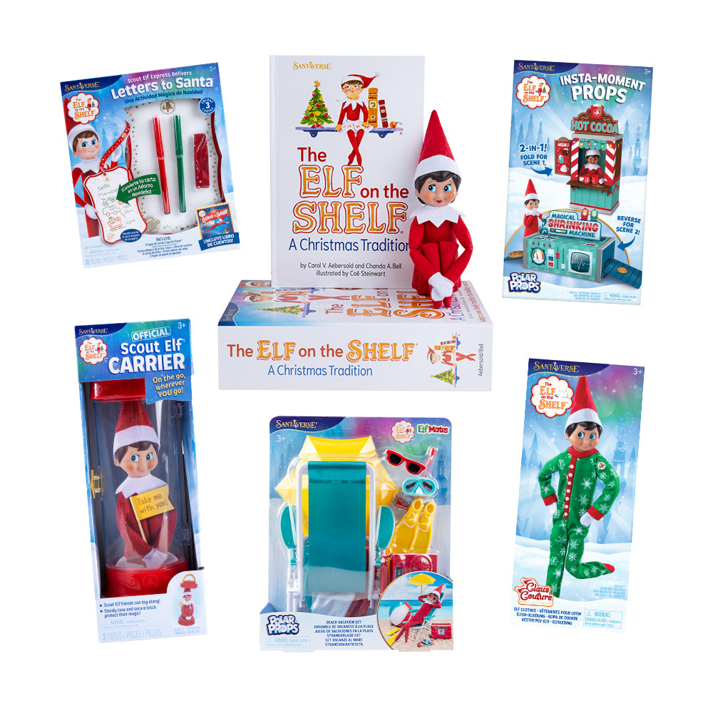 Packaging for Scout Elf Express Delivers Letters to Santa Mini,The Elf on the Shelf: A Christmas Tradition Box Set with girl with blue eyes, Polar Props™ Insta-Moment Props, the Official Scout Elf Carrier, Polar Props™ Beach Vacation Set, and Claus Couture Collection Snowflake Snuggle PJs