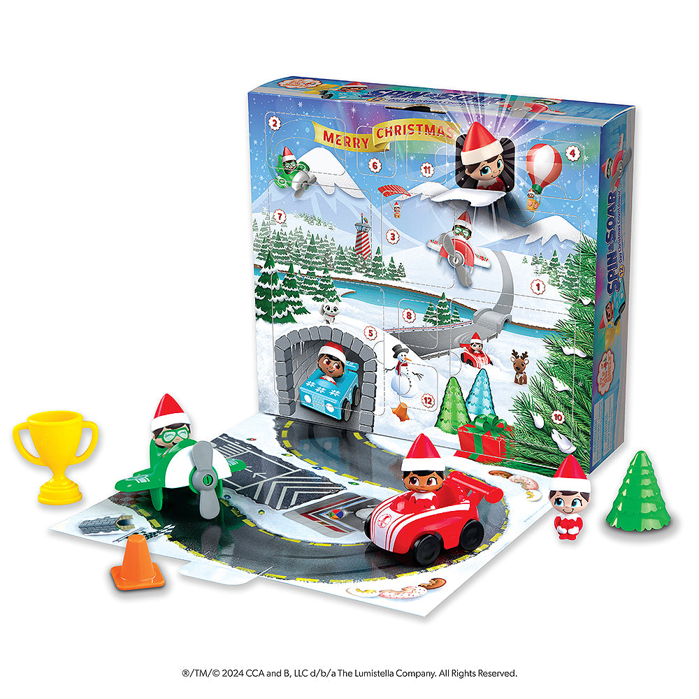 The Spin & Soar 12-Day Countdown to Christmas advent calendar folded out with toys staged on the playset