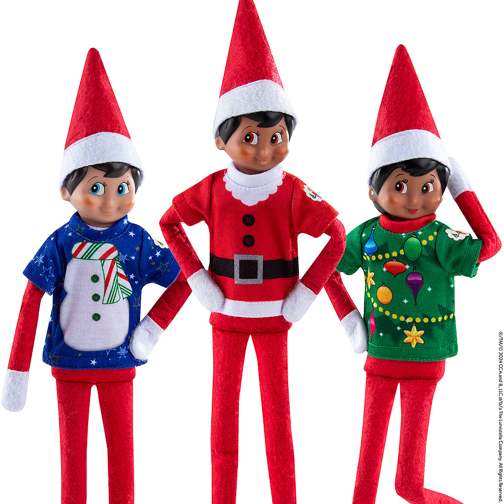 3 Scout Elves® posing in their tees from the Claus Couture Collection® Christmas T-Shirt Party Pack