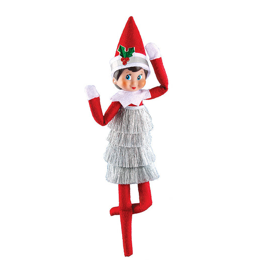 A girl Scout Elf® donning the Claus Couture Collection® Tiny Tinsel Dress and included headband.