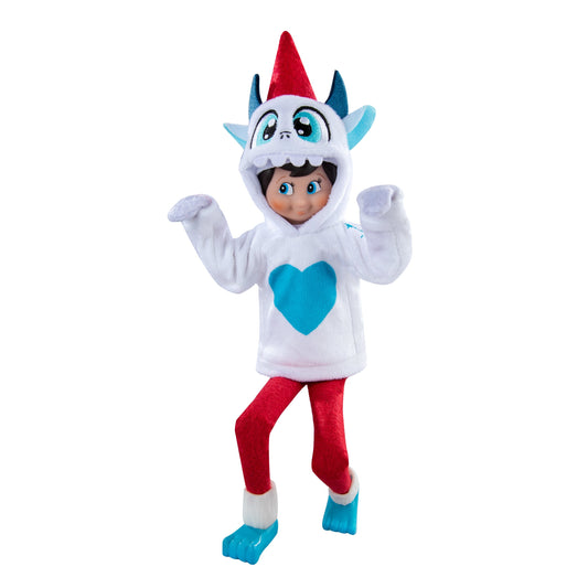 A Scout Elf® wearing the Claus Couture Collection® Yeti Hoodie Set, posed like they are sneaking around like a monster