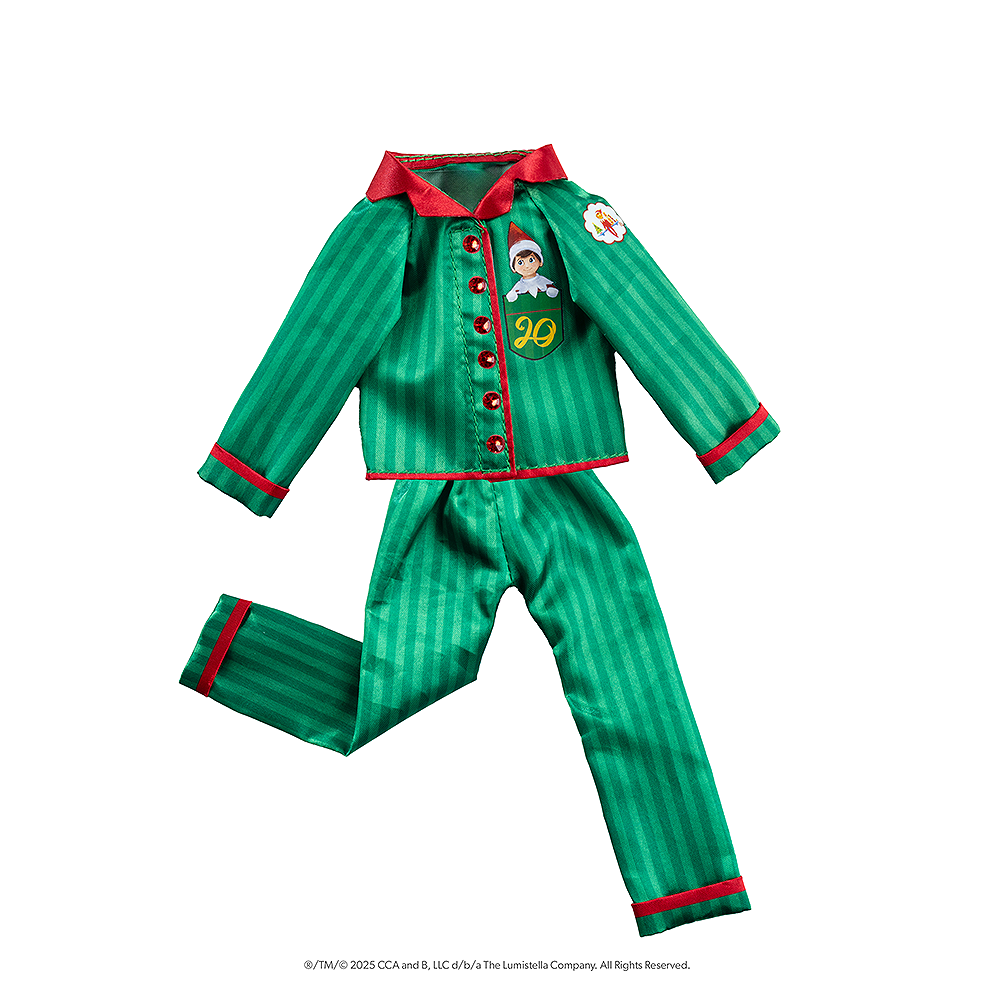 A flat lay product shot of the limited-edition luxury satin long pajama set from the The Elf on the Shelf®: A Christmas Tradition, Limited 20th Anniversary Edition. The buttons on the pajamas are Swarovski® crystals.
