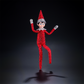 The included Scout Elf® boy with blue eyes poses to show off his flexible bending limbs for even easier elf scenes. Most notably, he is adorned from head to toe in Swarovski® crystals that coordinate with his signature style. A dark background surrounds him, with a spotlight shining down on his figure.