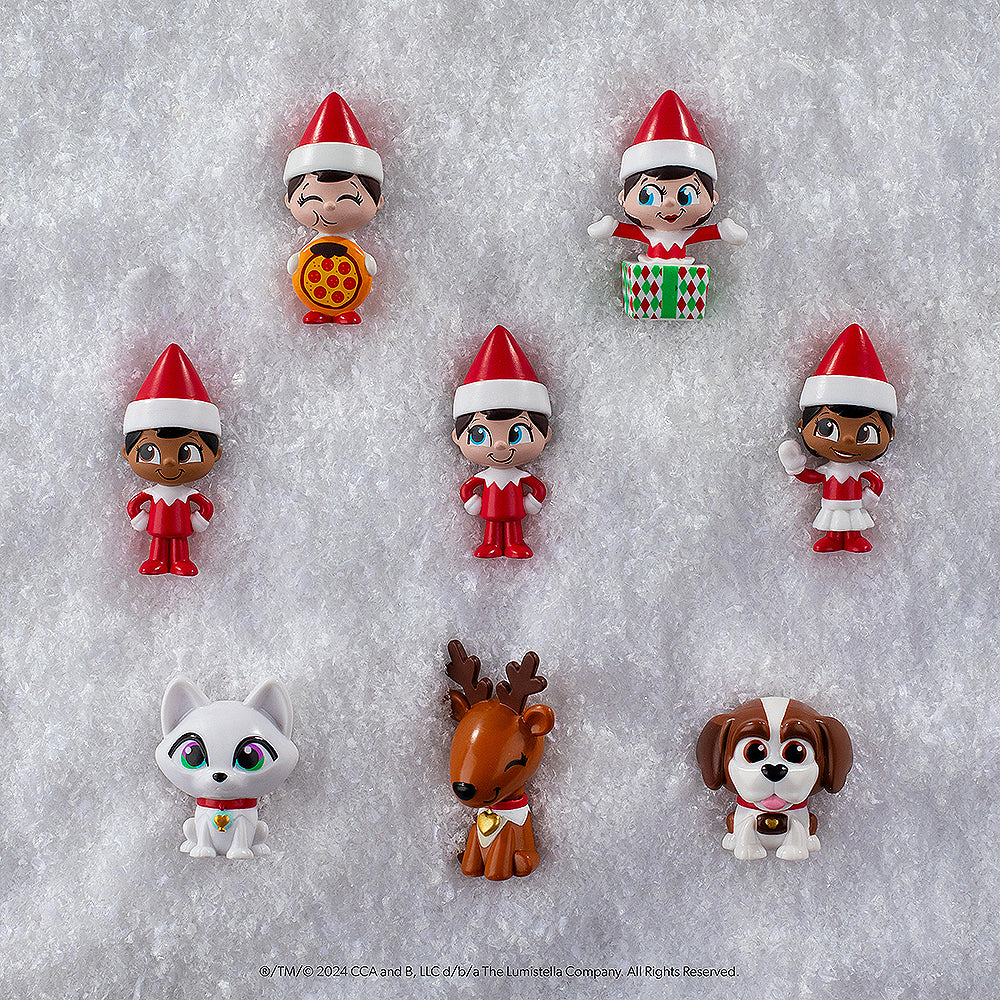 Secret SnoPrize™ series 3 mini figures arranged on snow