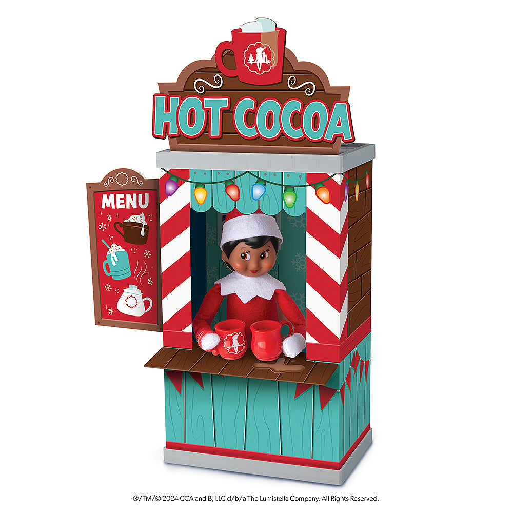 Scout Elf® serving hot cocoa from Hot Cocoa Bar Instaprop