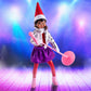A lifestyle image of a girl Scout Elf staged with the MagiFreez® Pop Star set in front of stage lighting.