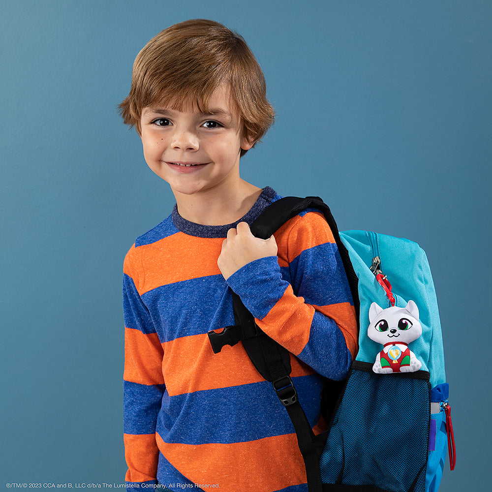 Boy with Elf Pets Arctic Fox Mini Clip clipped onto blue backpack