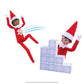 A pair of Scout Elves are having a snowball fight using props from the Polar Props™ The Official Elf Ideas Fun & Games Kit. One Scout Elf is posed taking cover and launching snowballs from behind an ice block wall, while another is getting tagged with a snowball in a fun illustration.