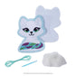 This image features the included items of the Noorah® Easy-Sew Ornament Kit. The included items are a front and back felt cutout of Noorah, which is perforated around the edges, a needle, some thread and cotton stuffing.