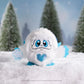 SnoBiggie™ Yeti SnoBall Surprise plush with snowball in hand in snowy forest