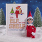 The Elf on the Shelf Tradition book with Scout Elf on a snowy forest, products rotating to show a 360 degree view