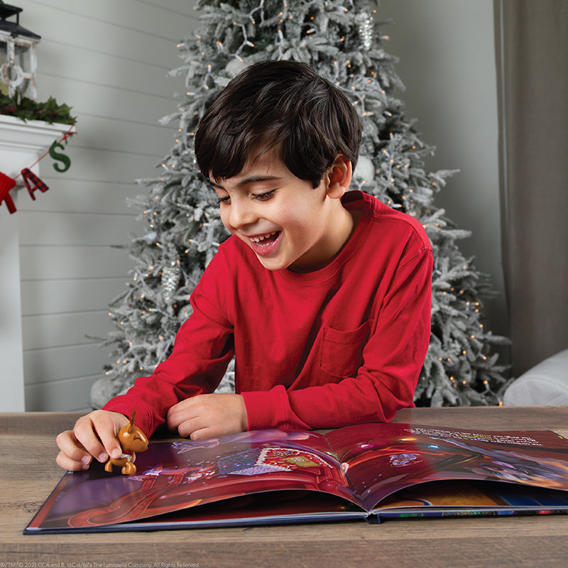 The Elf on the Shelf's The Night Before Christmas: boy reading book